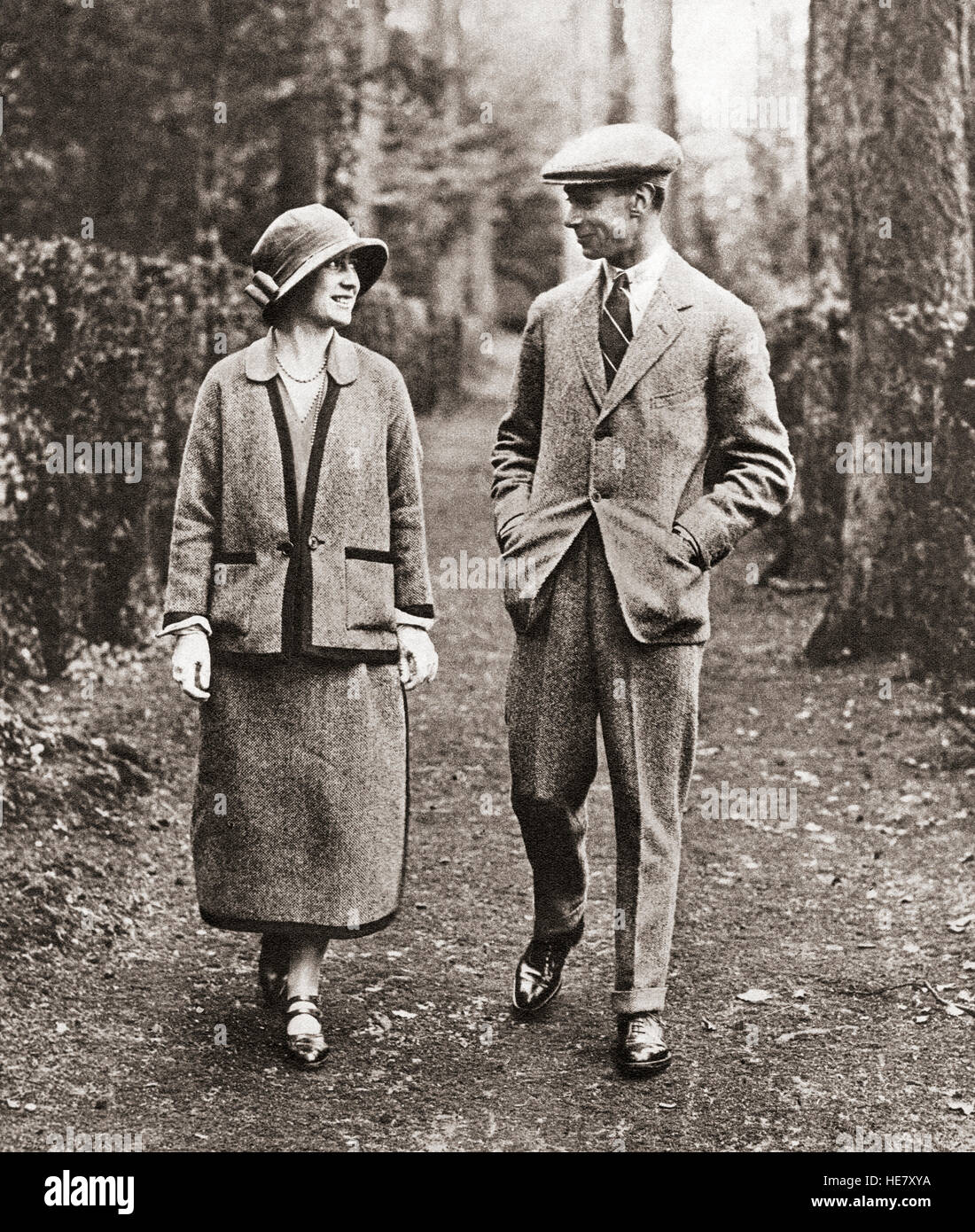 The Duke and Duchess of York strolling through the grounds of Polesdon Lacey, Surrey, England, on thier honeymoon in 1923.  Prince Albert, future King George VI, 1895 – 1952.  King of the United Kingdom and the Dominions of the British Commonwealth. Elizabeth Angela Marguerite Bowes-Lyon, future Queen Elizabeth, 1900 –2002. Stock Photo