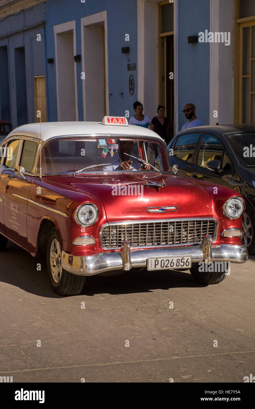 Red classic american 1950s Chevrolet car, Taxi, Trinidad, Cuba Stock Photo