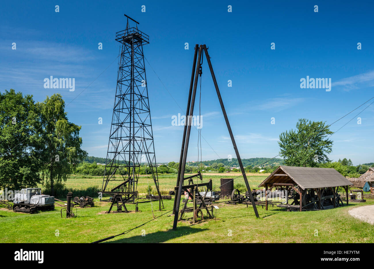 Oil drilling rigs used in Subcarpathian wells, oil industry exhibition at Rural Architecture Museum in Sanok, Malopolska, Poland Stock Photo