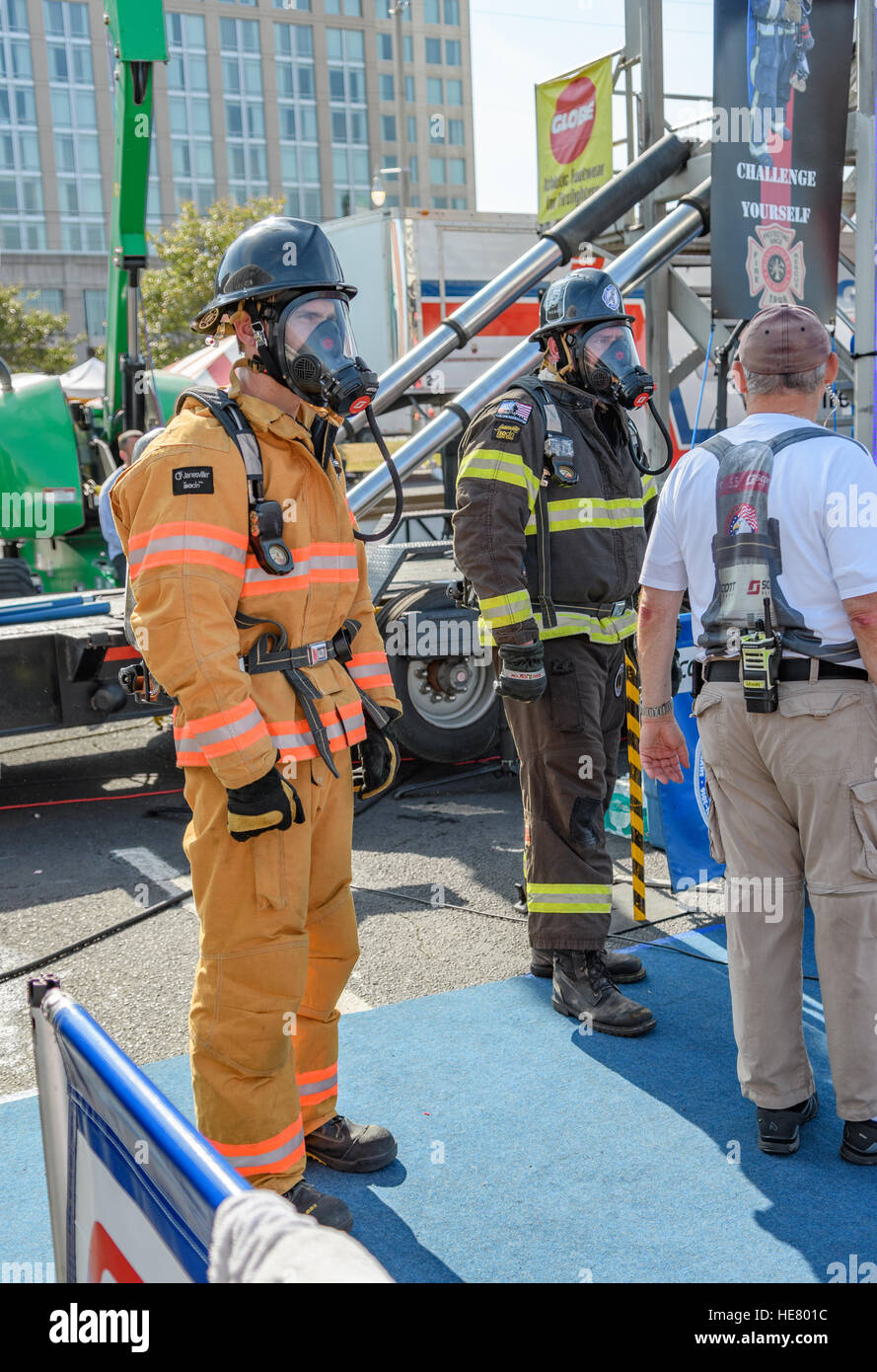 Firefighter in full turn out gear including oxygen mask coat and helmet. Stock Photo