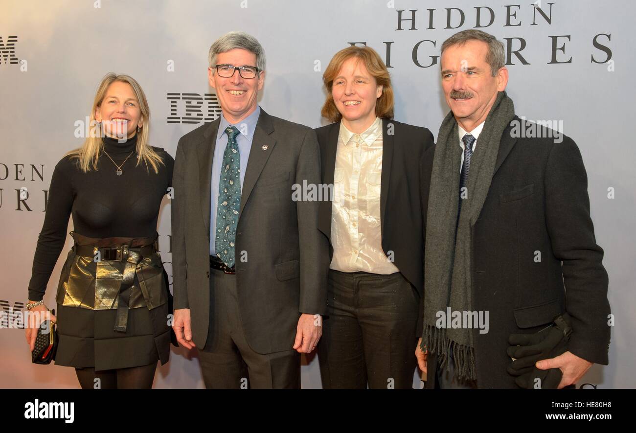 NASA Deputy Administrator Dava Newman (left), NASA Chief Historian Bill Barry, U.S. Chief Technology Officer Megan Smith, and Canadian astronaut Chris Hadfield walk the red carpet during the global celebration event for the film Hidden Figures at the SVA Theatre December 10, 2016 in New York City, New York. The film is based on the true story of the African-American women who worked as human computers during the Friendship 7 mission in 1962. Stock Photo