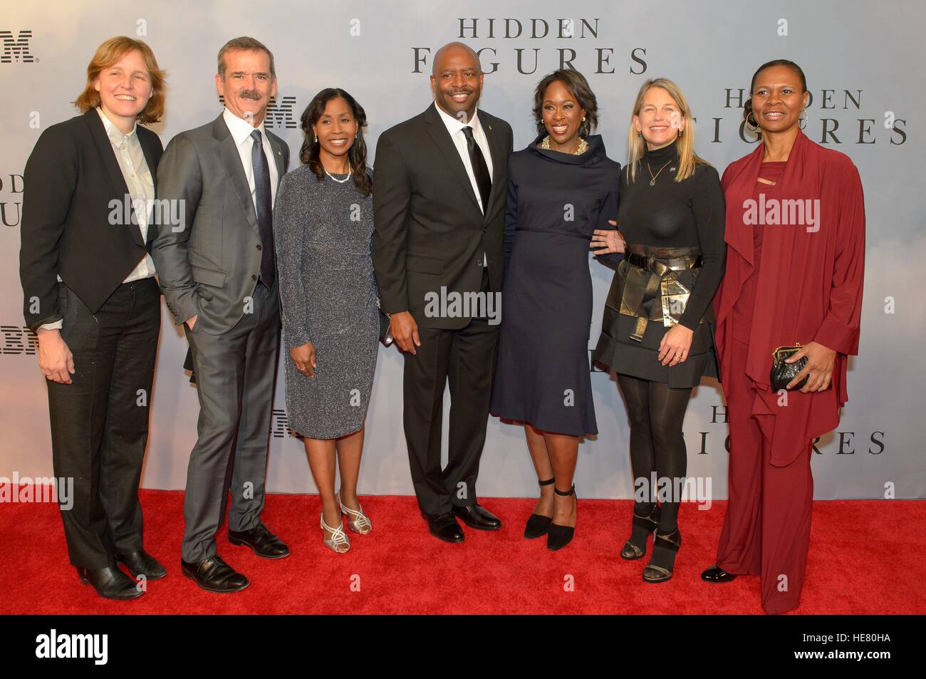 U.S. Chief Technology Officer Megan Smith (left), Canadian astronaut Chris Hadfield, NASA astronaut Stephanie Wilson, former NASA astronaut Leland Melvin, author Margot Lee Shetterly, NASA Deputy Administrator Dava Newman, and NASA astronaut Yvonne Cagle walk the red carpet during the global celebration event for the film Hidden Figures at the SVA Theatre December 10, 2016 in New York City, New York. The film is based on the true story of the African-American women who worked as human computers during the Friendship 7 mission in 1962. Stock Photo