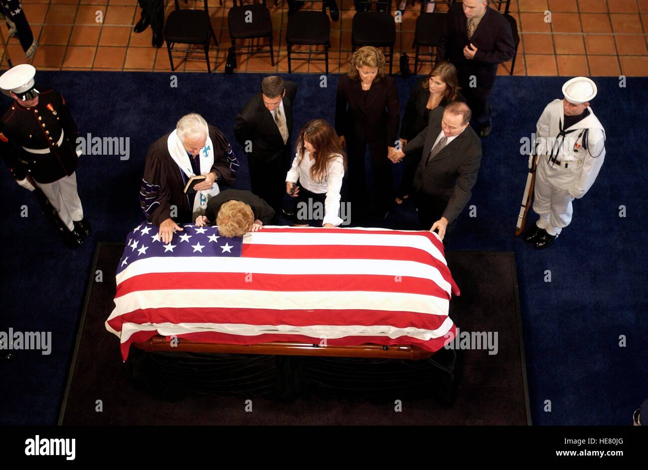 Former U.S. First Lady Nancy Reagan and family pay their respects to the casket of former U.S. President Ronald Reagan during a state funeral at the Ronald Reagan Presidential Library rotunda June 7, 2004 in Simi Valley, California. Stock Photo