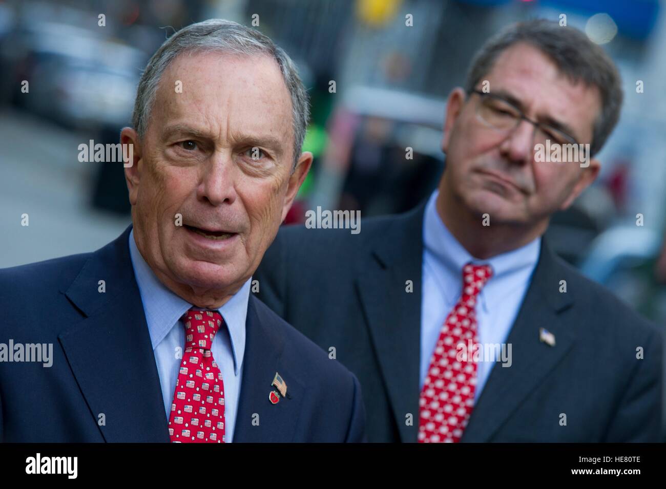 New York City Mayor Michael Bloomberg and U.S. Secretary of Defense Ashton Carter talk to the media before the Veterans Day Parade November 11, 2012 in New York City, New York. Stock Photo