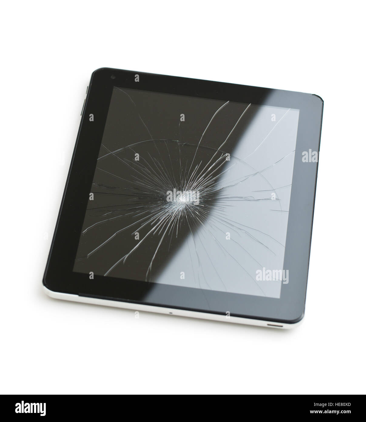 Tablet computer with broken screen isolated on white background. Stock Photo