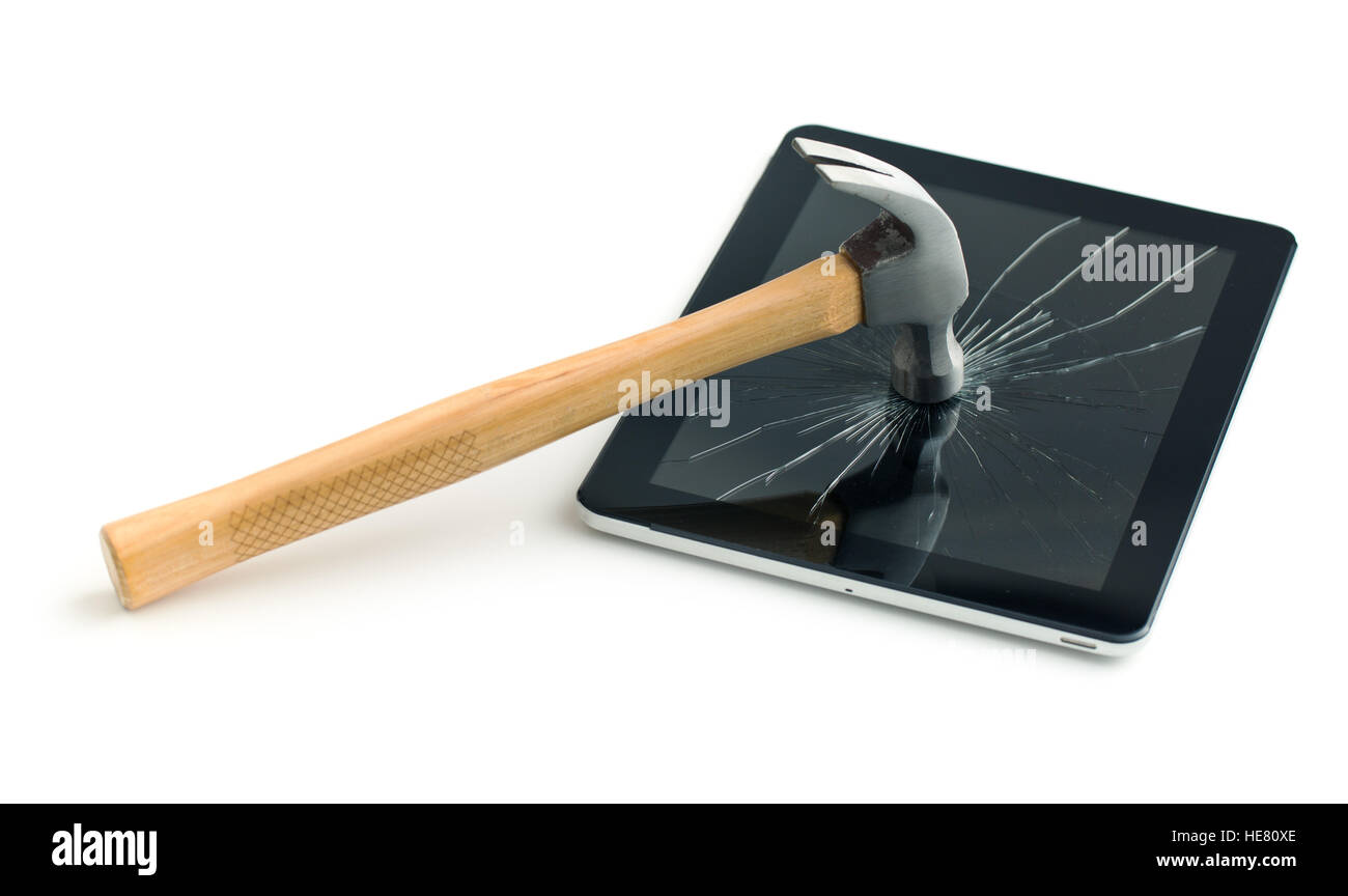 Tablet screen broken with a hammer. Isolated on white background. Stock Photo