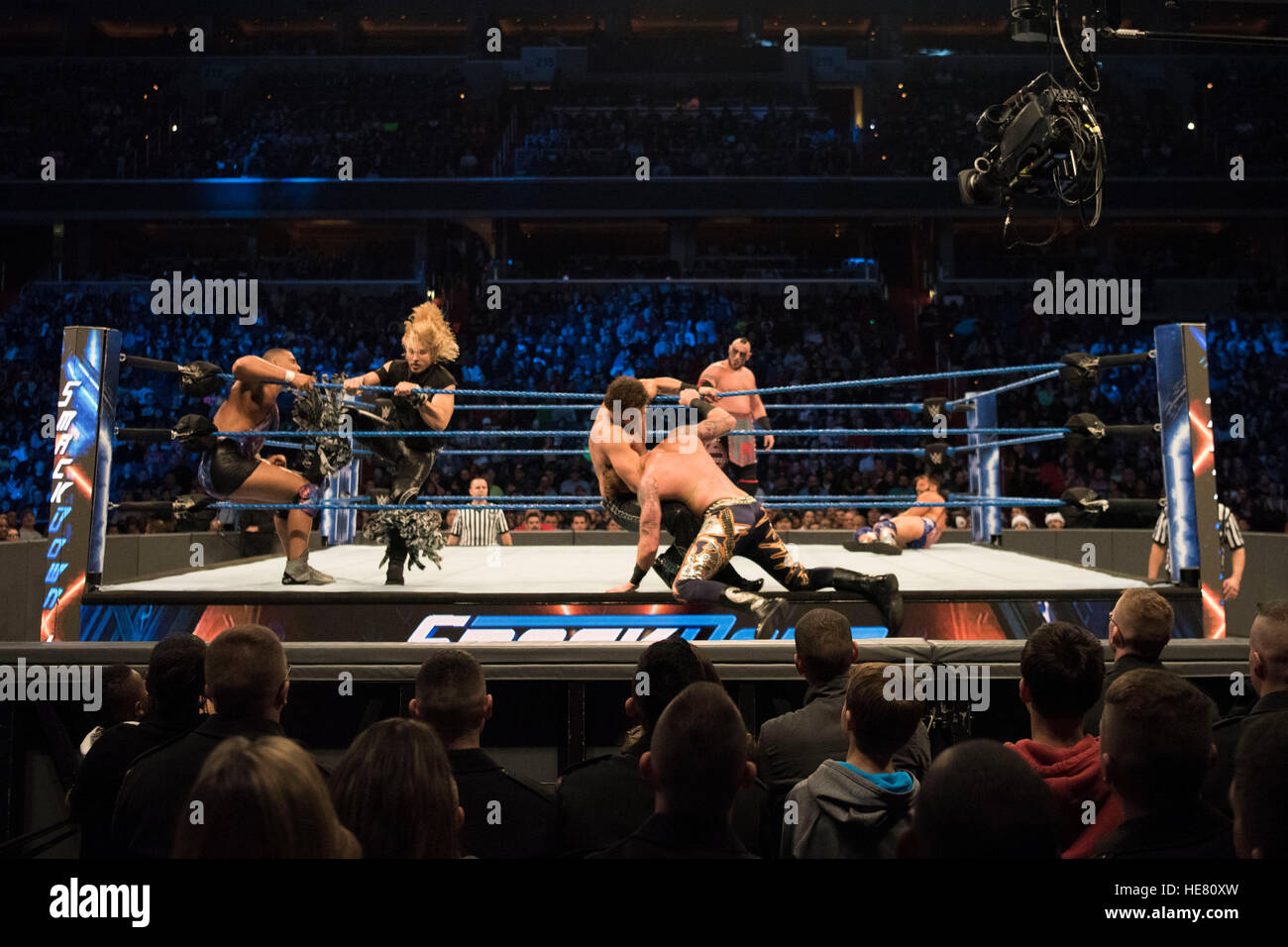 WWE performers participate in a wrestling match at the 14th Annual Tribute tot he Troops Event at the Verizon Center December 13, 2016 in Washington, DC. Stock Photo