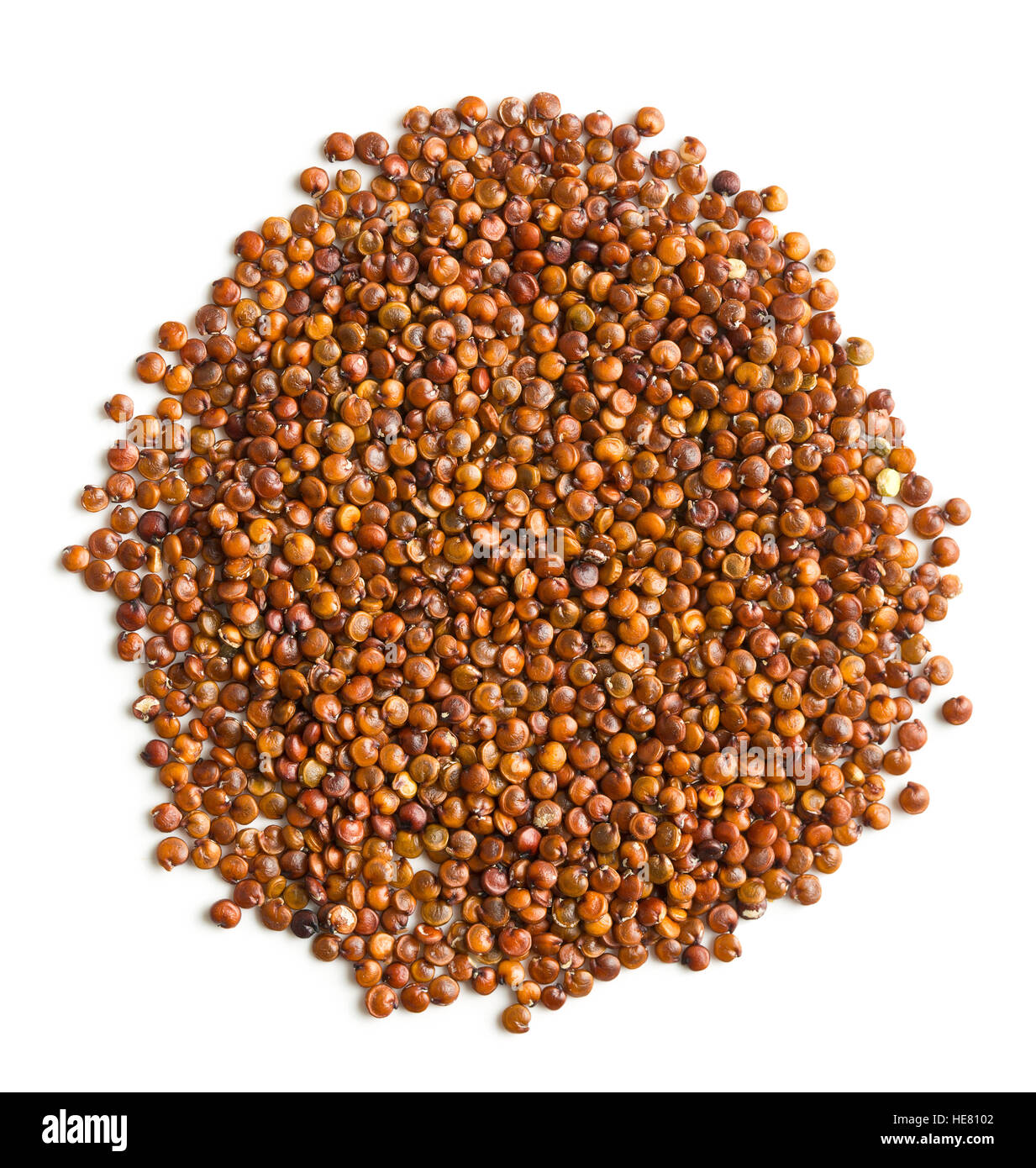 Red quinoa seeds isolated on white background. Stock Photo
