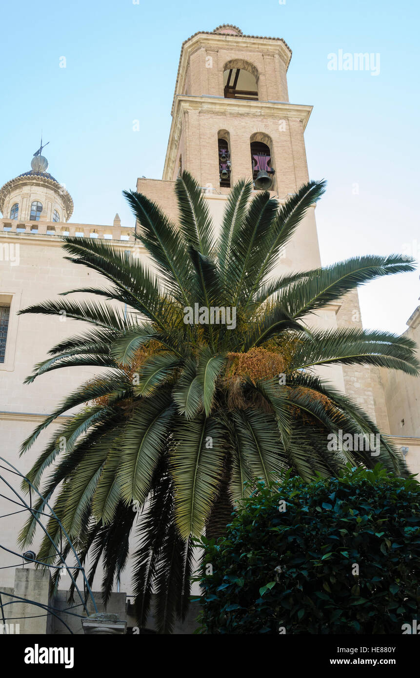 A Saint Nicolas church down view from a street of Alicante city, Spain ...