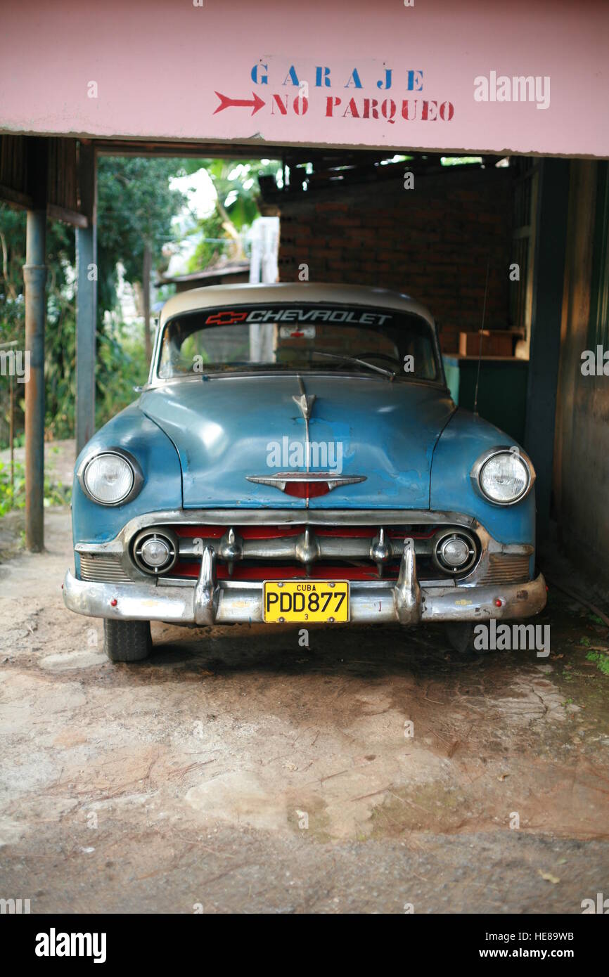 Vintage car in a garage in Vinales, Pinar del Río Province, Cuba, Latin America Stock Photo