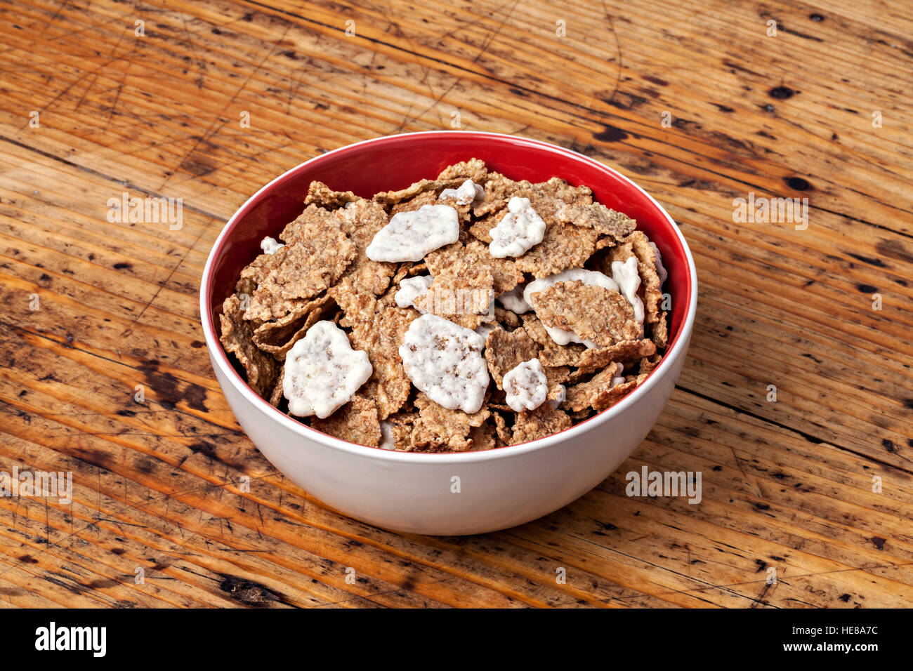 Image of bowl muesli on a wooden table Stock Photo
