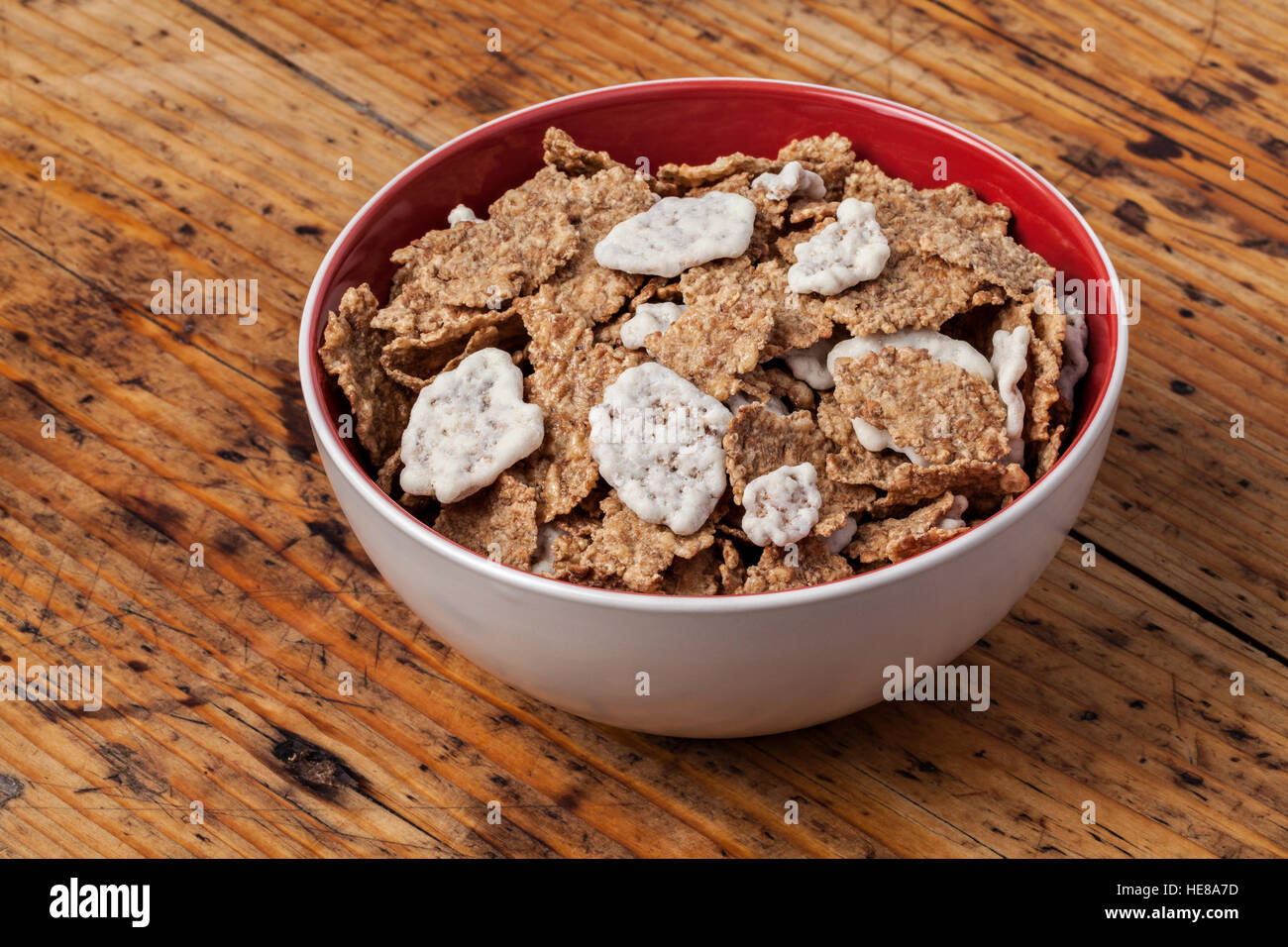 Image of bowl muesli on a wooden table. Stock Photo
