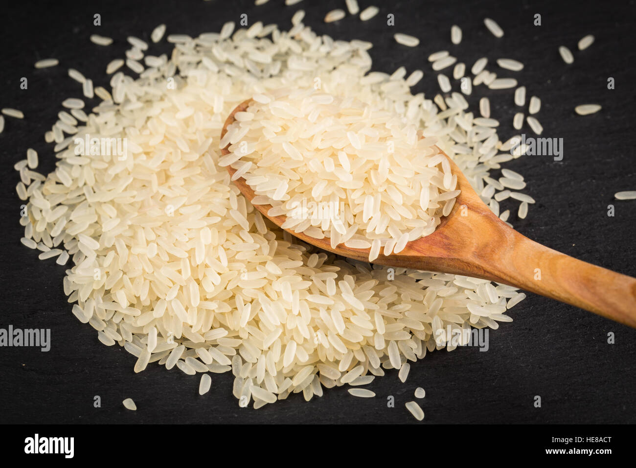 spoon of rice on puffed rice cereal background close up Stock Photo - Alamy