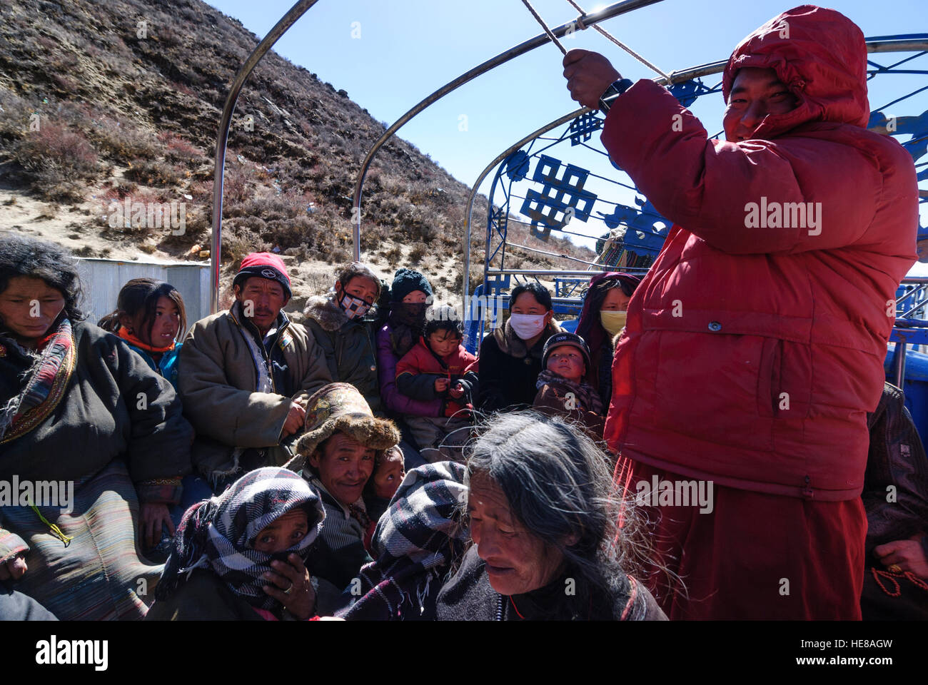 Samye: Pilgrim on a truck on the way back from the Chim Puk hermitage, Tibet, China Stock Photo