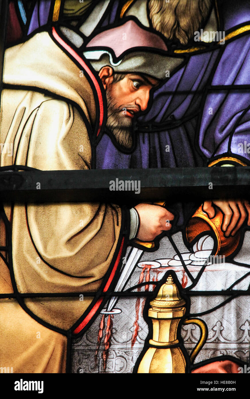 Stained Glass depicting the local legend of a Jew desecrating sacramental bread, in the Cathedral of Brussels, Belgium. This antisemitic legend dates  Stock Photo
