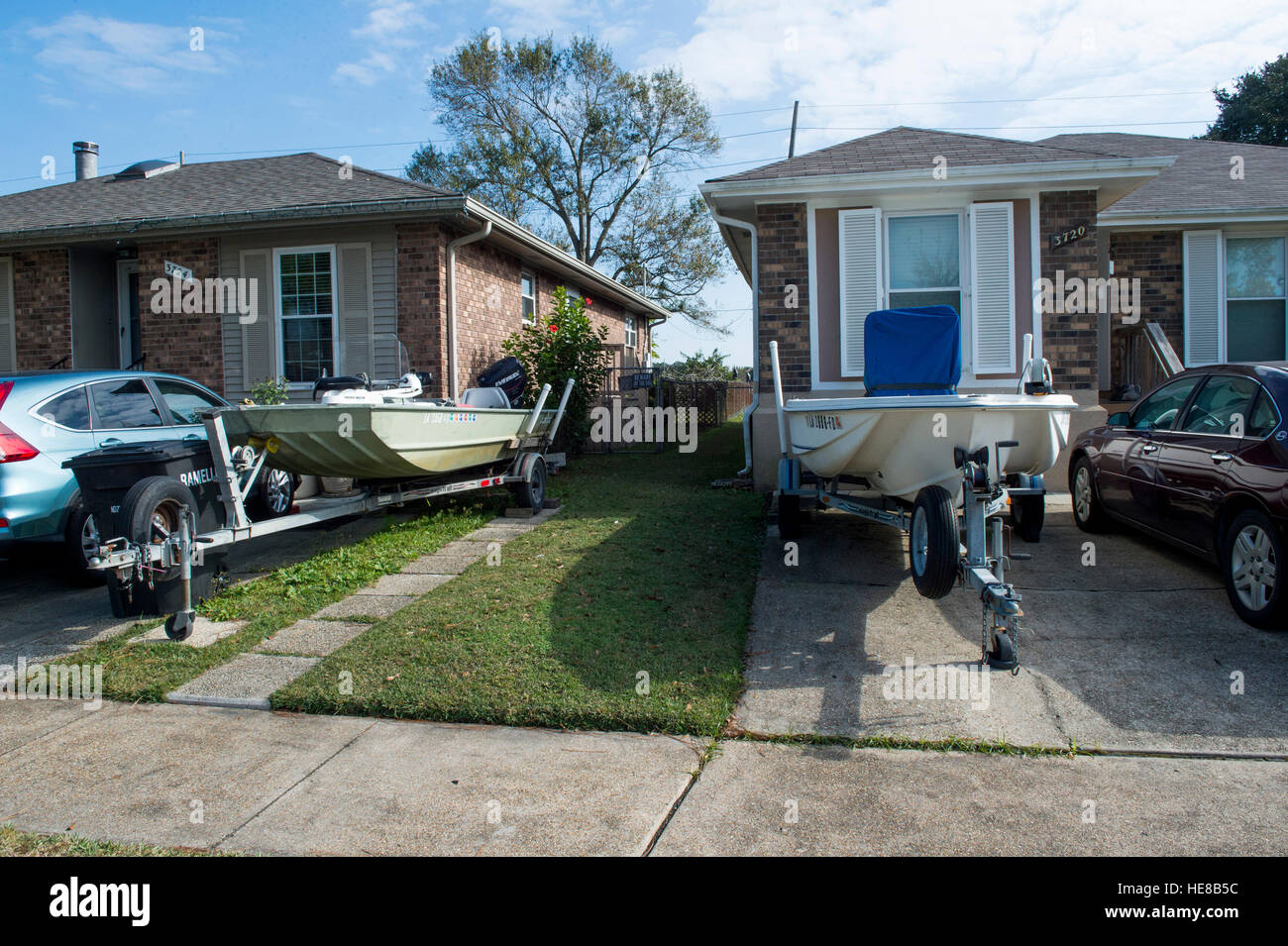 Boats parked in residential front yards in Kenner, La. on Friday, Dec. 16, 2016. Stock Photo