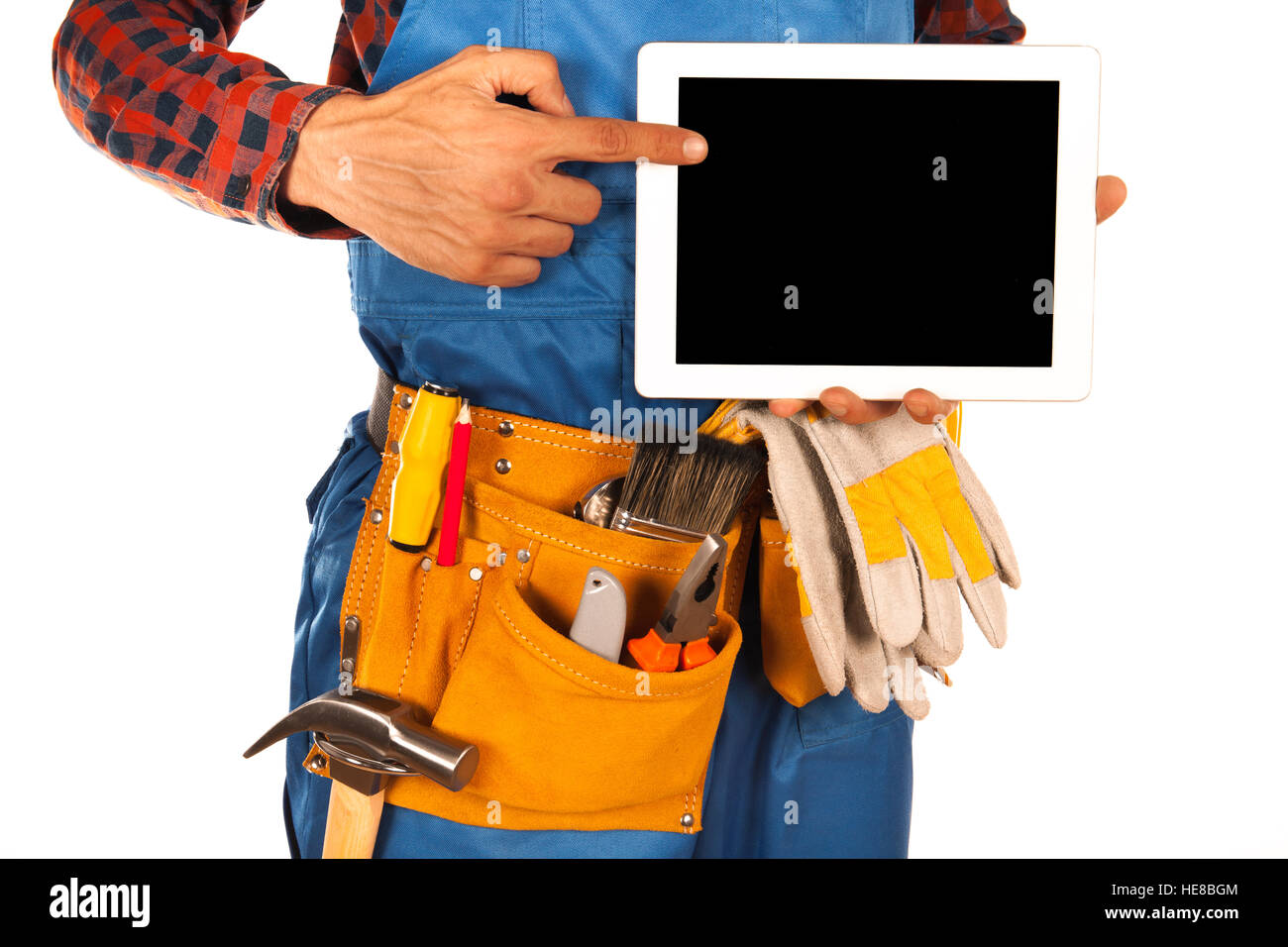 Manual worker man isolated on white with tablet Stock Photo