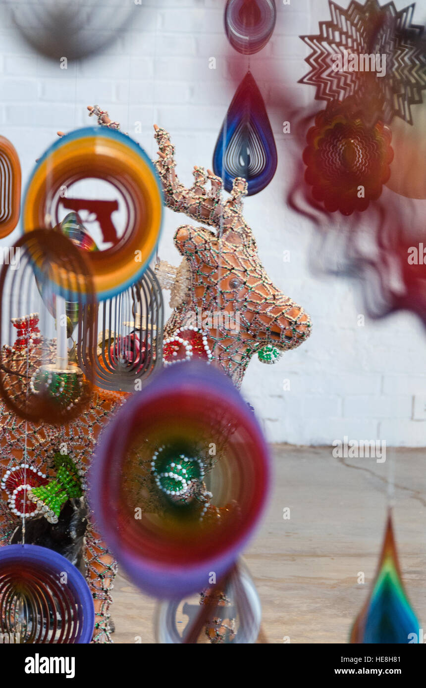 Detail of gun-violence wind spinners and beaded deer in ‘Until,’ an installation by artist Nick Cave at Mass MoCA. Stock Photo