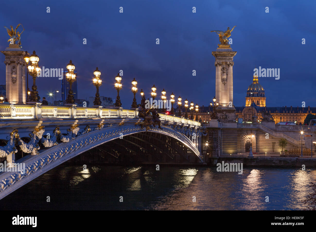 PARIS - JULY 13,2014: The Pont Alexandre III is a deck arch bridge that spans the Seine in Paris Stock Photo