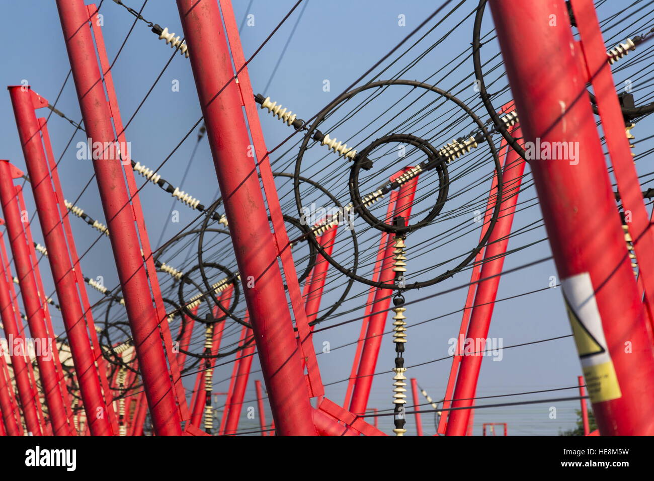 Communication wires lead to switching station from radio transmitter