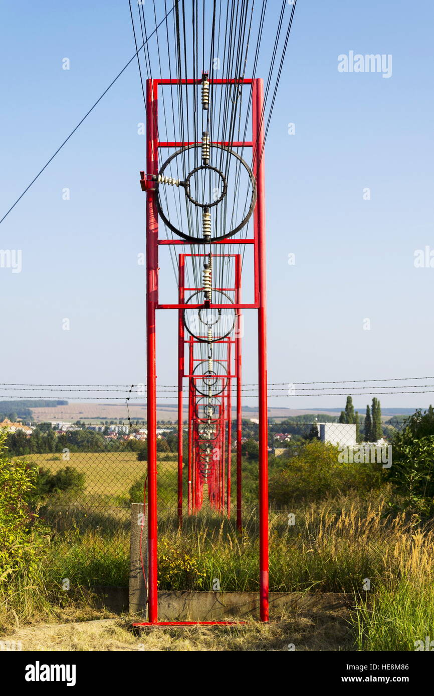 Communication wires lead to switching station from radio transmitter
