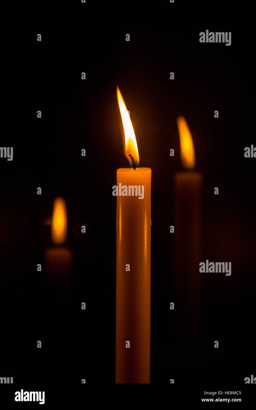 burning candle with black background Stock Photo Alamy