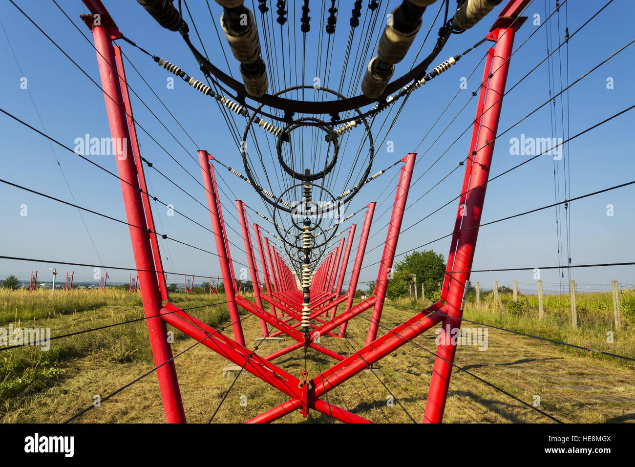 Communication wires lead to switching station from radio transmitter