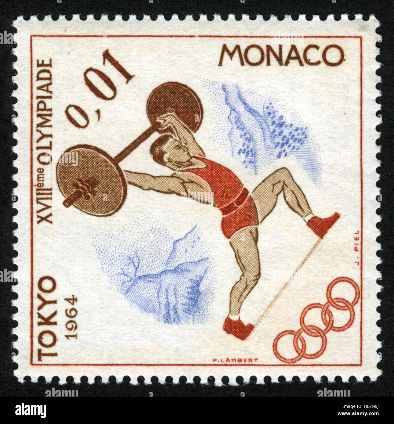 MONACO - CIRCA 1964-12-03, Postage stamp from Monaco depicting a weightlifter, issued for the 1964 Summer Olympics in Tokyo Stock Photo