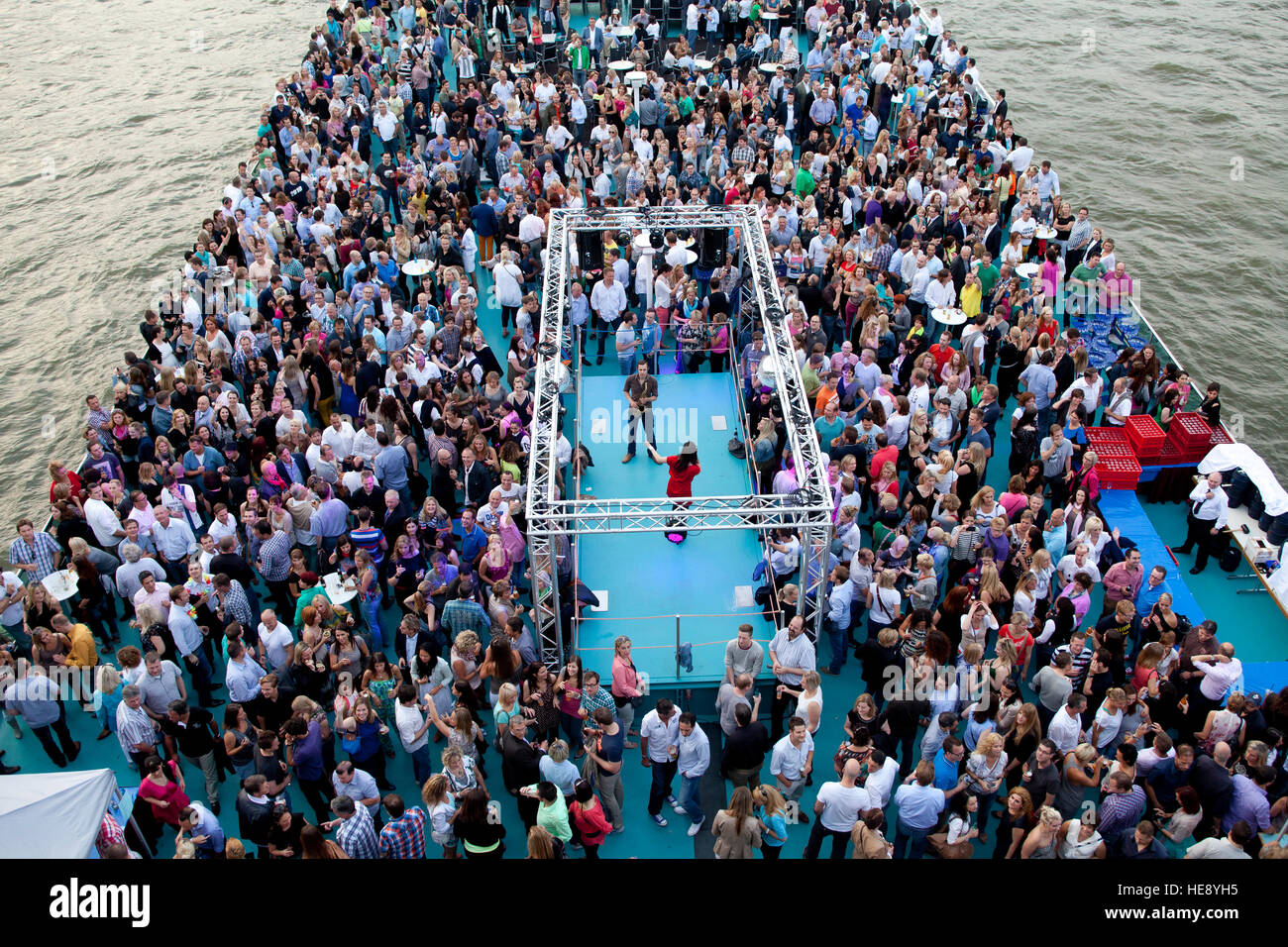 Germany, Cologne, people on the event ship RheinEnergie Stock Photo