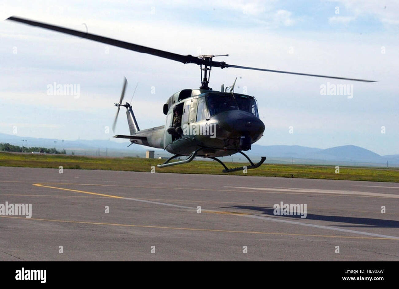 A UH1N Huey helicopter prepares to land at Malmstrom Air Force Base
