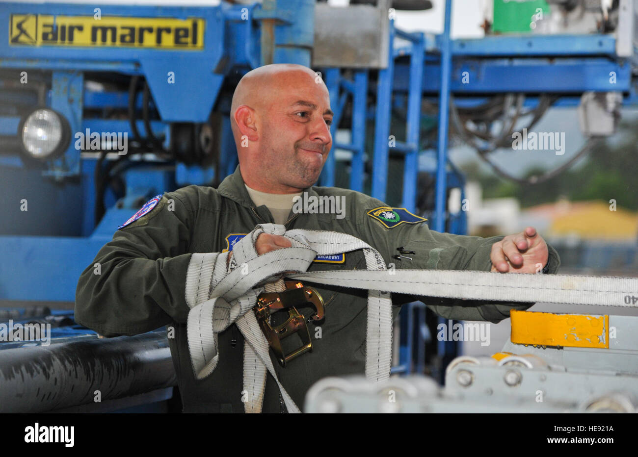 Nevada Air National Guard Chief Master Sgt. Tim Broadway, C-130 Hercules loadmaster, 192nd Airlift Squadron, helps offload cargo from a C-130 in Calvi France on May 25, 2014, in support of Allied Forge 2014.  This exercise, led by the U.S. Army 82nd Airborne Division in conjunction with the 152nd and 165th Air National Guard Airlift Wings, is the first-ever interoperability exercise designed to enhance bilateral capabilities between the United States and the French 2nd Foreign Parachute Regiment.  Tech. Sgt. Erica J. Knight Stock Photo