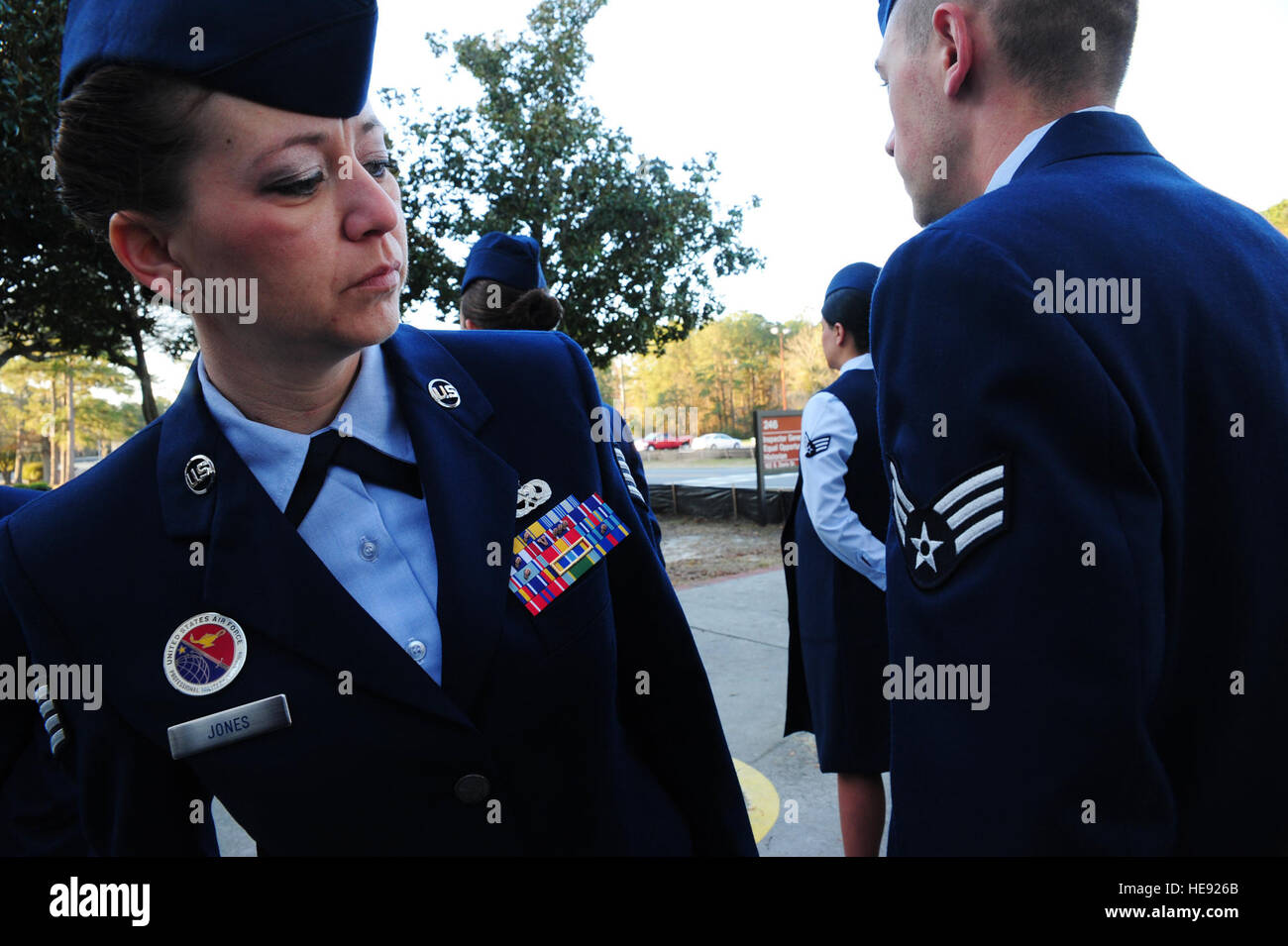 An ALS instructor inspects Airmen's dress uniforms at Joint Base Charleston  to maintain Air Force uniform compliance Stock Photo - Alamy