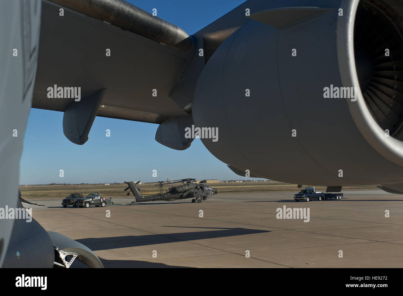 U.S. Air Force maintainers from the 97th Maintenance Directorate tow a ...