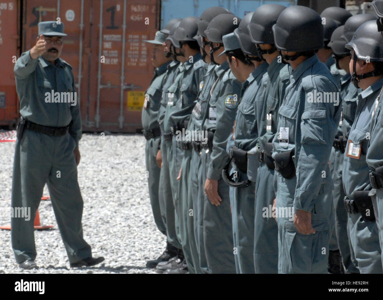 KABUL, Afghanistan (June 6, 2010) -- A group of Afghan National Civil Order Police trainees prepare to graduate from training to then be deployed to regions throughout Afghanistan. Brig. Gen. Carmelo Burgio, Combined Training Advisory Group-Police commander, spoke to the graduates and charged them with the duties of working hard and protecting the Afghan Nation's children.  Staff Sgt. Jeff Nevison) Stock Photo