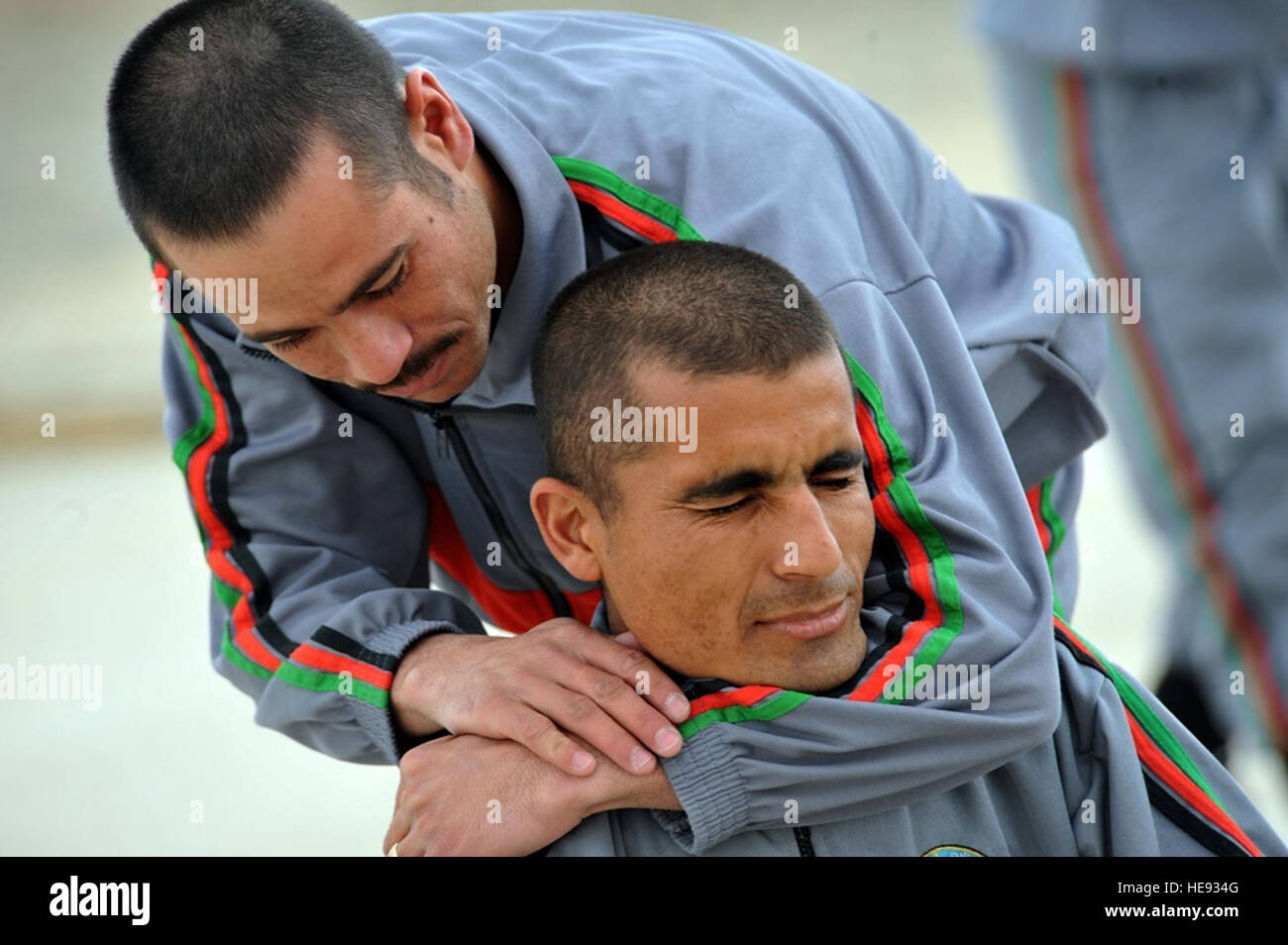 Afghan National Police trainees practice empty hand techniques ...