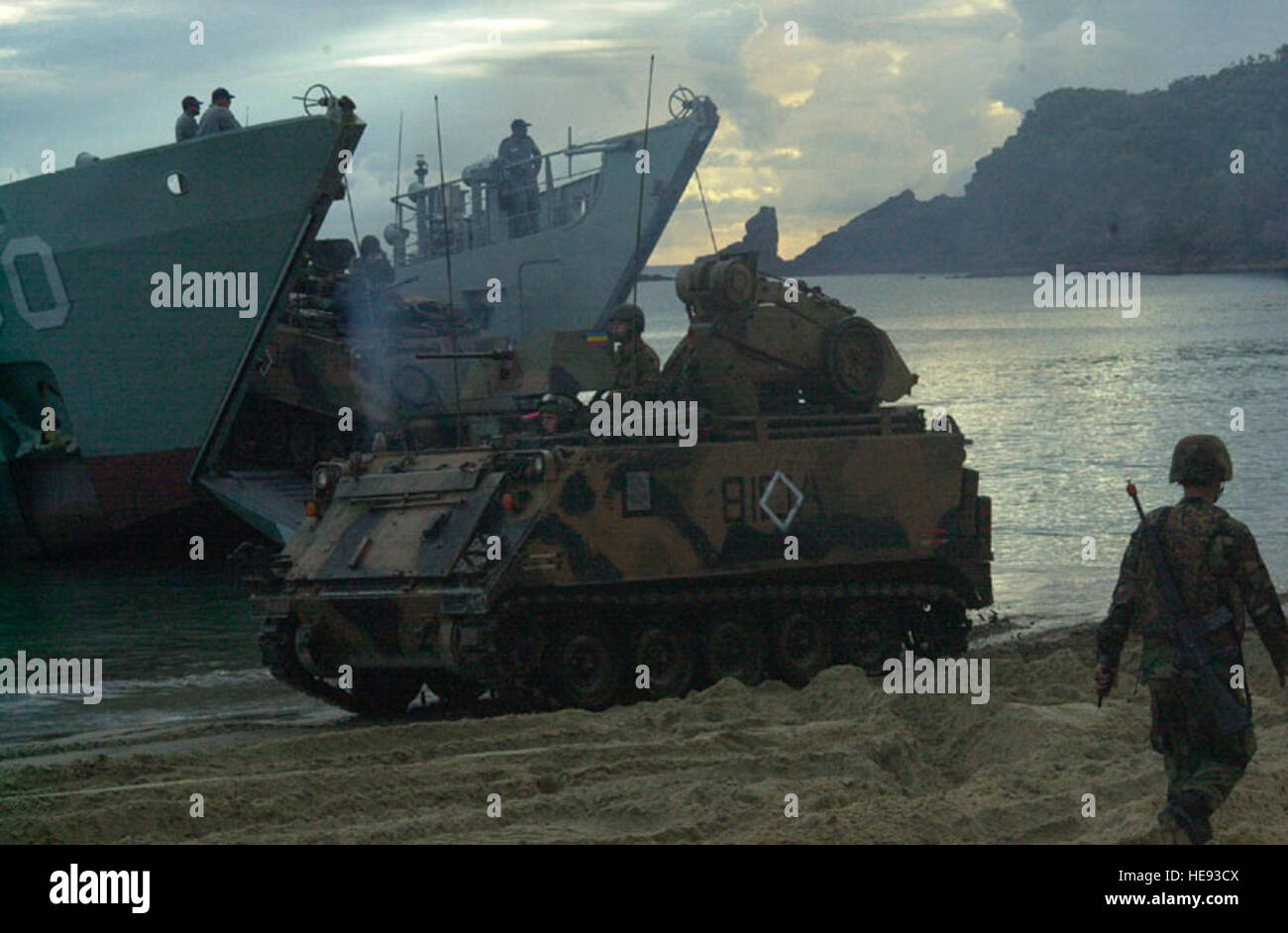 010518-O-1168M-014 -- EXERCISE TANDEM THRUST 2001, SHOALWATER BAY, Australia  -- An M113 Armored Personnel Carrier (APC)  debarks a Landing Craft Vehicle (LCV) during an amphibious landing exercise on Freshwater Beach during Exercise Tandem Thrust.  Exercise Tandem Thrust 2001 is a combined United States, Australian and Canadian military training exercise. This biannual exercise is being held in the vicinity of Shoalwater Bay training area, Queensland, Australia.  More than 27,000 Soldiers, Sailors, Airmen and Marines are participating, with Canadian units taking part as opposing forces. The p Stock Photo