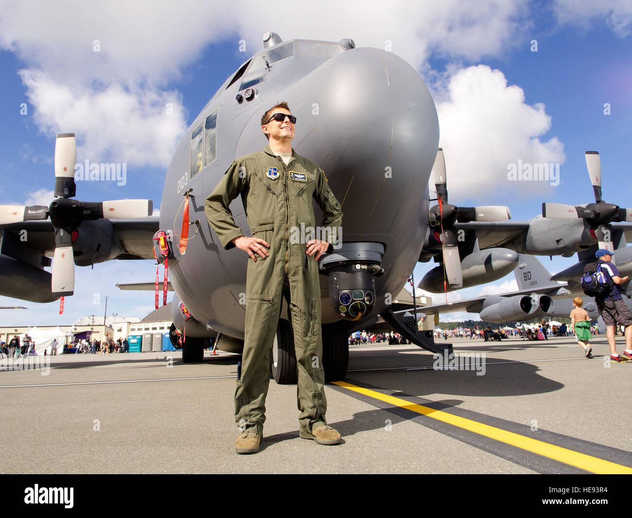 Air National Guard Master Sgt. Ryan Conti, a flight engineer with the 211th Rescue Squadron, stands with his C-130 King, July 26, 2014, during JBER's Arctic Thunder Open House. The C-130 King is a special variant of the transport aircraft suited to pararescue operations and is equipped to refuel other aircraft in flight from its wing pylon tanks. Conti is a native of Denver. The Arctic Thunder Open House features more than 40 Air Force, Army and civilian aerial acts, July 25-27, and has an expected crowd of more than 200,000 people. It is the largest two-day event in the state and one of the p Stock Photo