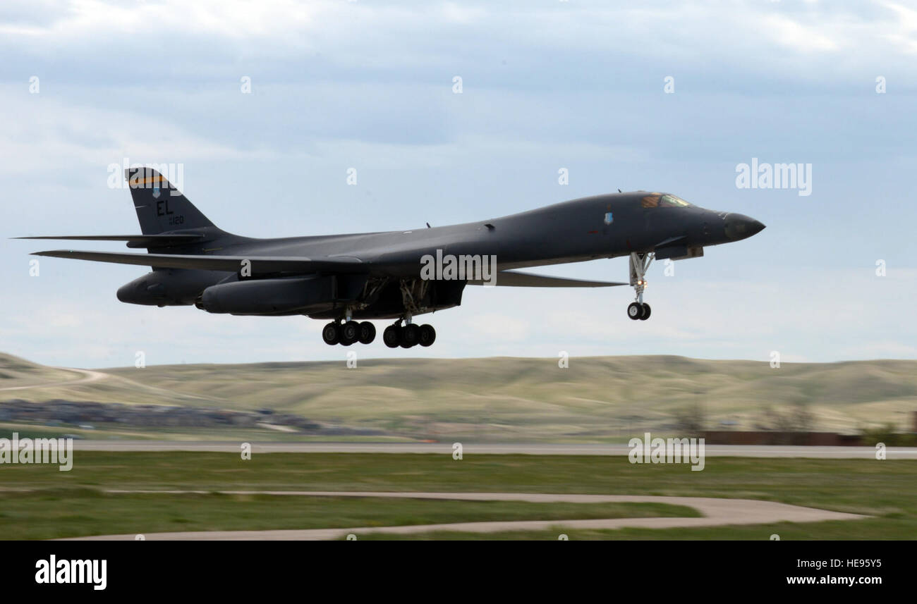 The 28th Bomb Wing’s first B-1B Lancer upgraded with Sustainment Block-16 touches down at Ellsworth Air Force Base, S.D., May 2, 2016. With the upgraded B-1’s return from Tinker AFB, Okla., Ellsworth Airmen will be able to put their training from the IBS-updated sim to the test. Airman Donald Knechtel) Stock Photo