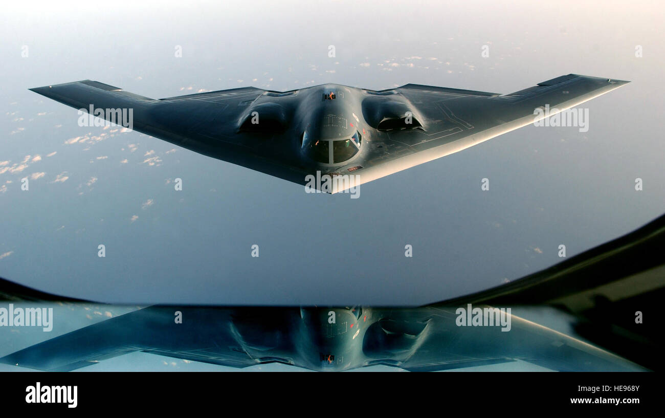 OPERATION IRAQI FREEDOM -- A B-2 Spirit, returning from a mission supporting Operation Iraqi Freedom, takes on fuel from a KC-135 Stratotanker over the Indian Ocean on March 27.   Staff Sgt. Cherie A. Thurlby) Stock Photo