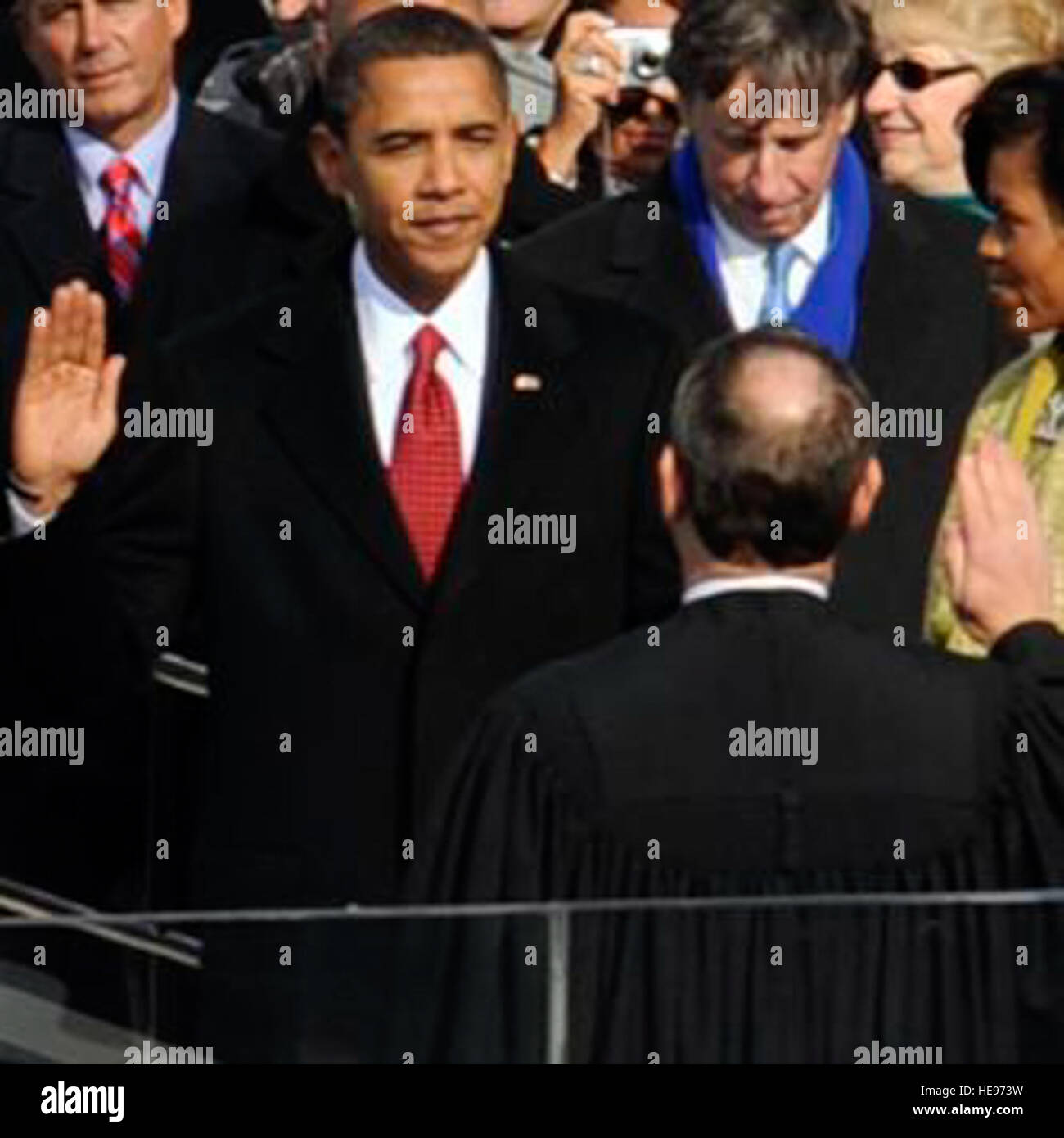 Barack Hussein Obama takes the oath of office from U.S. Chief Justice John G. Roberts Jr. in Washington, D.C., Jan. 20, 2009, becoming the 44th president of the United States.  More than 5,000 men and women in uniform are providing military ceremonial support to the presidential inauguration, a tradition dating back to George Washington's 1789 inauguration.   Master Sgt. Cecilio Ricardo, U.S. Air Force Stock Photo