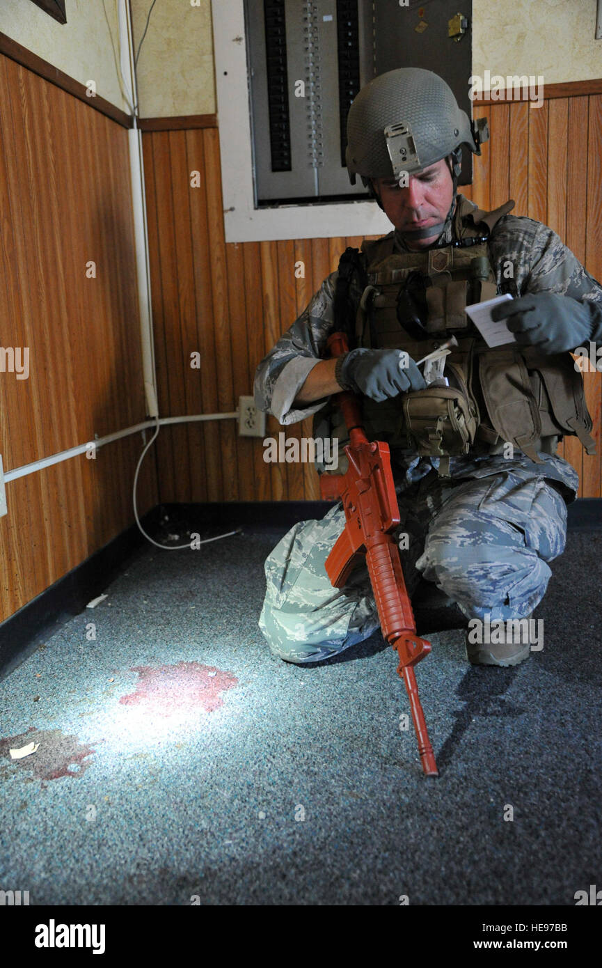 Combat camera personnel and military members conduct battlefield ...