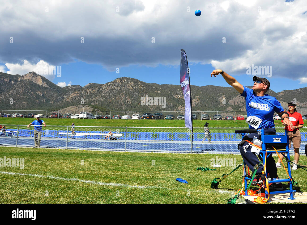 Retired Chief Master Sgt. Damian Orslene hurls a shot put during the 2013 Warrior Games at the U.S. Air Force Academy May 14, 2013, in Colorado Springs, Colo. The Warrior Games enable service members and veterans who are injured, ill or wounded to compete in a variety of Paralympic-style sports. Staff Sgt. Christopher Boitz) Stock Photo