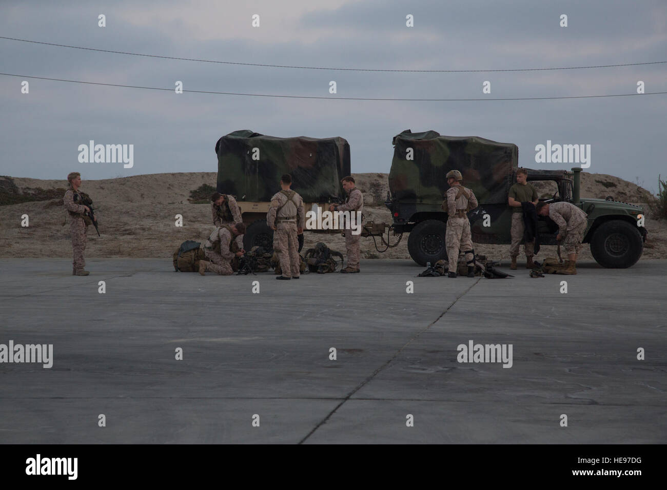 MARINE CORPS BASE CAMP PENDLETON, California (July 29, 2016) – U.S. Marines with 1st Reconnaissance Battalion, 1st Marine Division prepare for a beach insert during the Southern California portion of Rim of the Pacific 2016 aboard Marine Corps Base Camp Pendleton, July 29, 2016. Marines and Canadian soldiers conducted beach landings to enhance communication and adaptability between the two nations. Twenty-six nations, more than 40 ships and submarines, more than 200 aircraft and 25,000 personnel are participating in RIMPAC from June 30 to Aug. 4, in and around the Hawaiian Islands and Southern Stock Photo