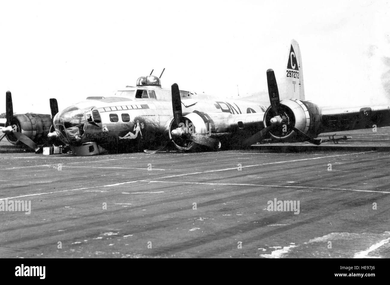 Emergency wheels-up landing of Boeing B-17G-45-BO (S/N 42-97272) (BN-T) 'Duchess Daughter' of the 303rd Bomb Group, 359th Bomb Squadron. Note: The original 'Duchess' (S/N 41-24561), also coded BN-T, was the aircraft in which Lt. Jack W. Mathis earned his Medal of Honor. Lt Mathis was lead bombardier for a mission on March 18, 1943, when the 'Duchess' was hit by flak. Lt. Mathis, although seriously wounded, completed the bomb run. He died soon after. (U.S. ) Stock Photo