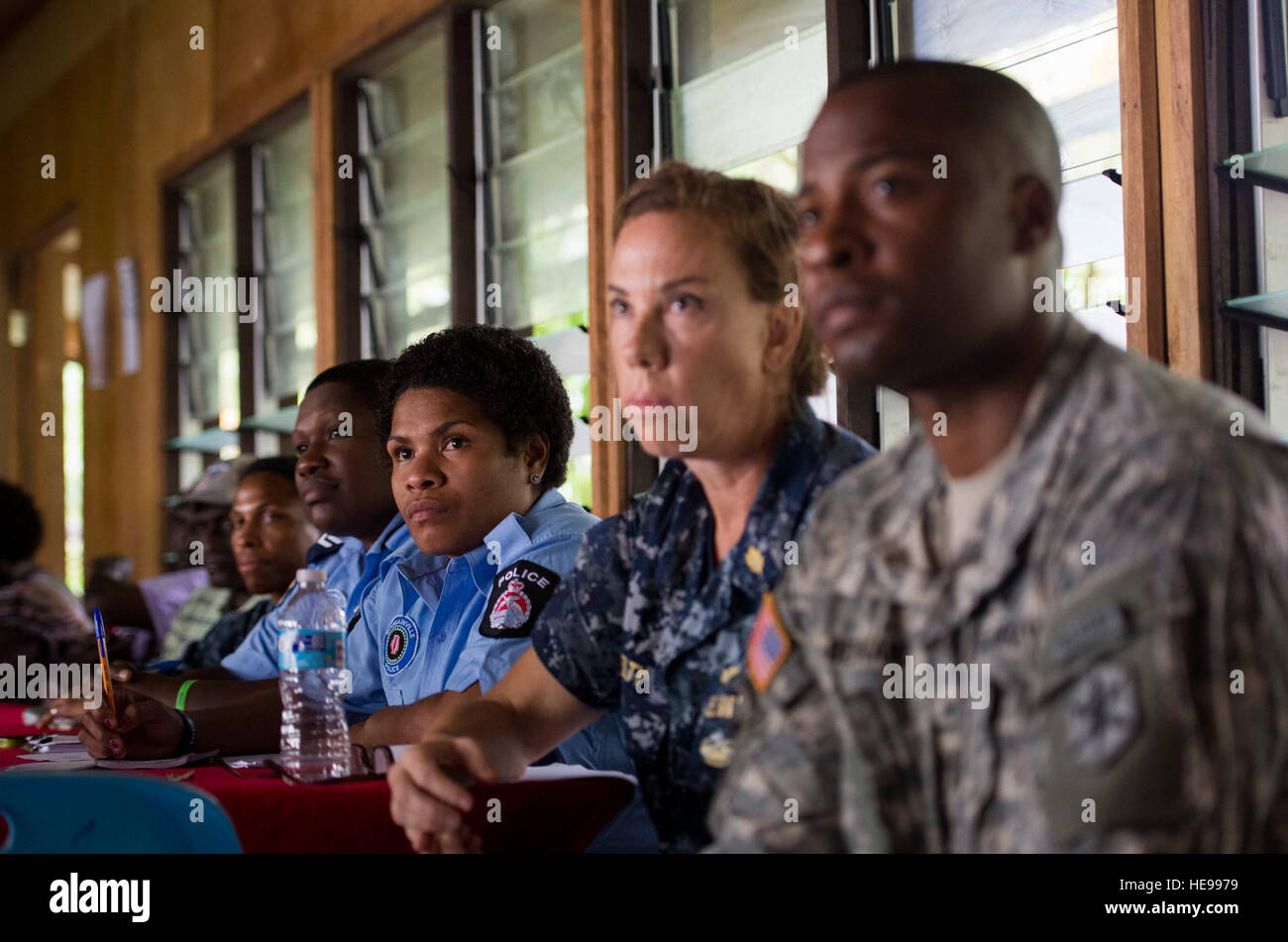 ARAWA, Autonomous Region of Bougainville, Papua New Guinea (July 2, 2015) Leaders from Bougainville, the Royal Papua New Guinea Constabulary, and Pacific Partnership 2015 conduct a family violence prevention workshop at the Tuniva Learning Center. Leaders from Bougainville and the hospital ship USNS Mercy (T-AH 19) conducted the workshop as part of the National Action Plan on Women, Peace and Security. Mercy is currently in Papua New Guinea for its second mission port of PP15. Pacific Partnership is in its 10th iteration and is the largest annual multilateral humanitarian assistance and disast Stock Photo