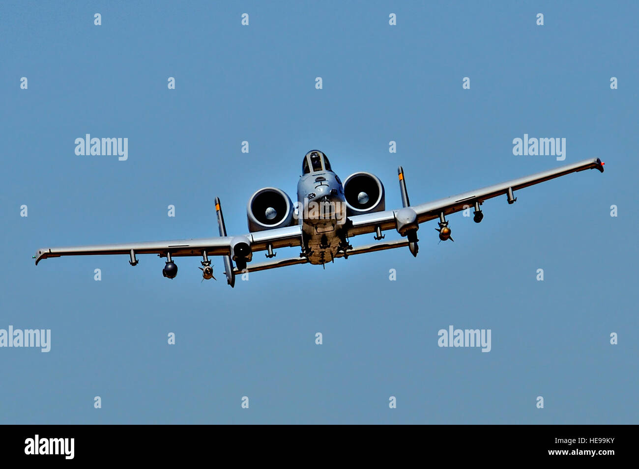 A U.S. Air Force A-10C Thunderbolt II assigned to the 357th Fighter Squadron flies while being directed by British armed forces joint tactical air controllers at Barry M. Goldwater Range, Ariz., Sept. 23, 2015. The frequent air traffic at BMGR provided the JTACs with a fast track to becoming more proficient in their career field. Airman 1st Class Chris Drzazgowski Stock Photo