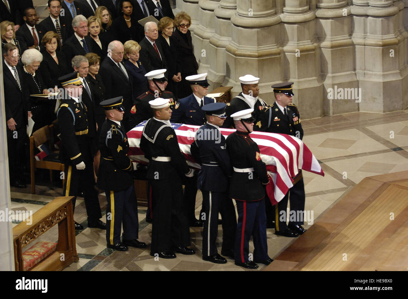 WASHINGON -- The casket of President Gerald R. Ford is carried past a group that includes President George W. Bush, first lady Laura Bush and Presidents George Bush Sr., Bill Clinton and Jimmy Carter at the National Cathedral in Washington Jan 2, 2007.  The president's final resting place will be in his hometown of Grand Rapids, Mich., at a site just north of the Gerald R. Ford Museum.  Senior Airman Daniel R. DeCook)() Stock Photo