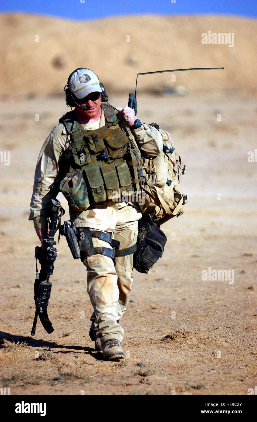A U.S. Air Force combat controller practices firing movements during ...