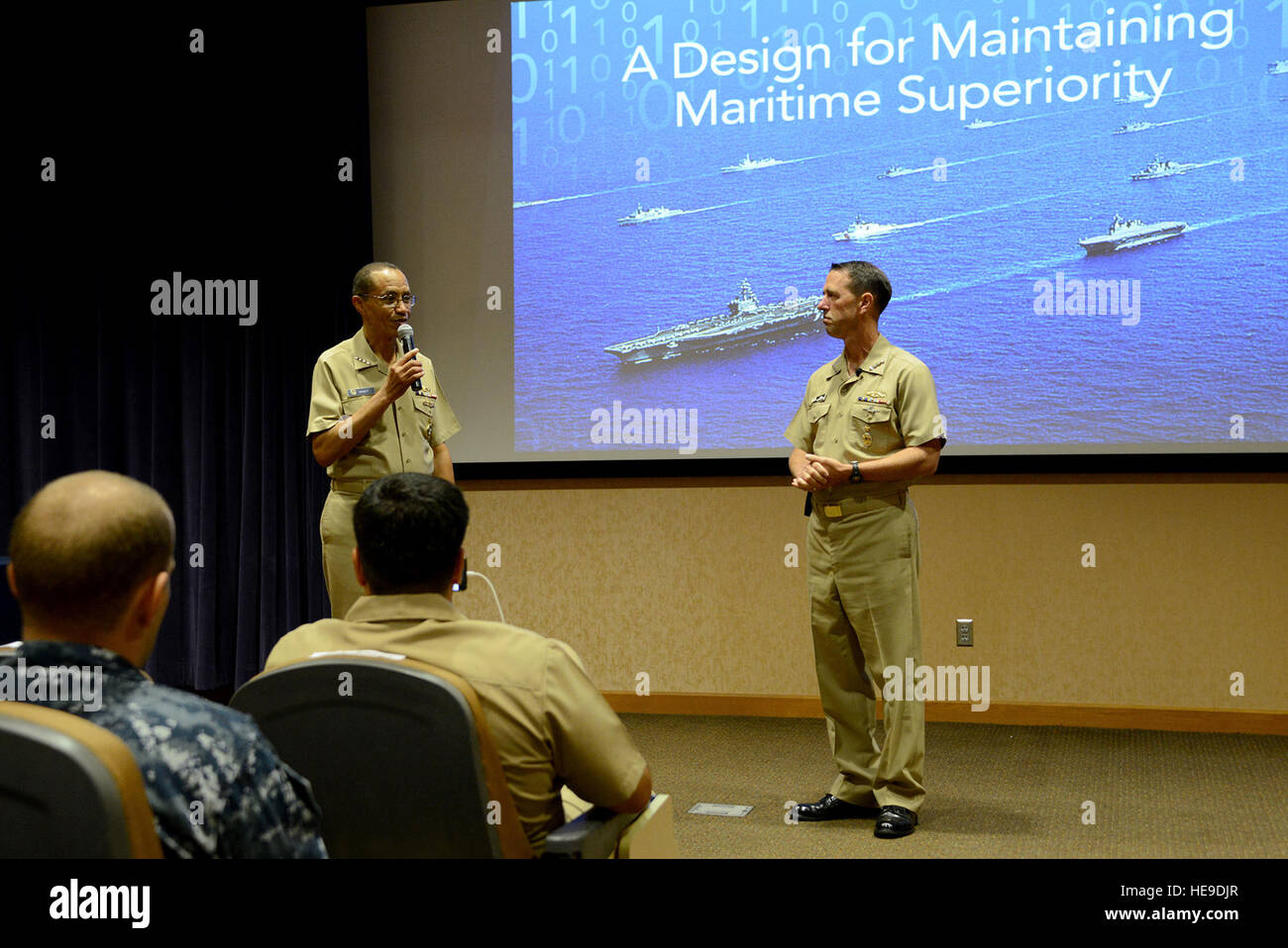 U.S. Navy Adm. Cecil D. Haney (left), U.S. Strategic Command (USSTRATCOM) commander, introduces the Chief of Naval Operations (CNO), U.S. Navy Adm. John M. Richardson, during a Navy all-hands call at Offutt Air Force Base, Neb., Aug. 24, 2016. During the forum, Richardson discussed the U.S. Navy’s design for maintaining maritime security today and into the future and answered questions from members of the audience. While here, Richardson also participated in discussions with Haney and other USSTRATCOM leaders on modernization of the sea-based leg of the nuclear triad and other areas of collabo Stock Photo