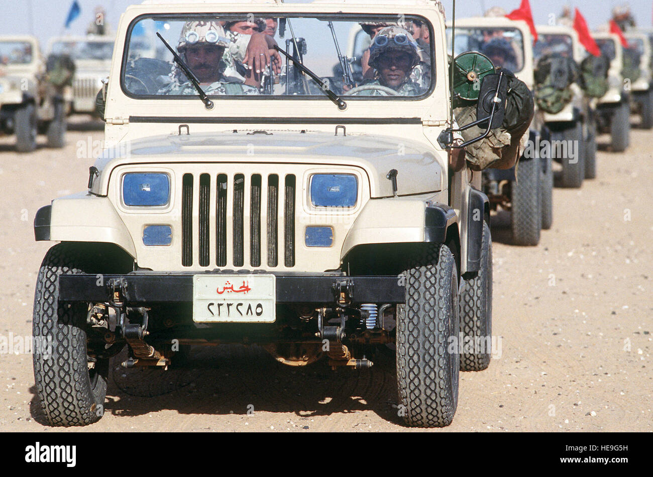 Crews of an Egyptian ranger battalion parade in Jeep light vehicles in